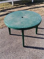green plastic patio table