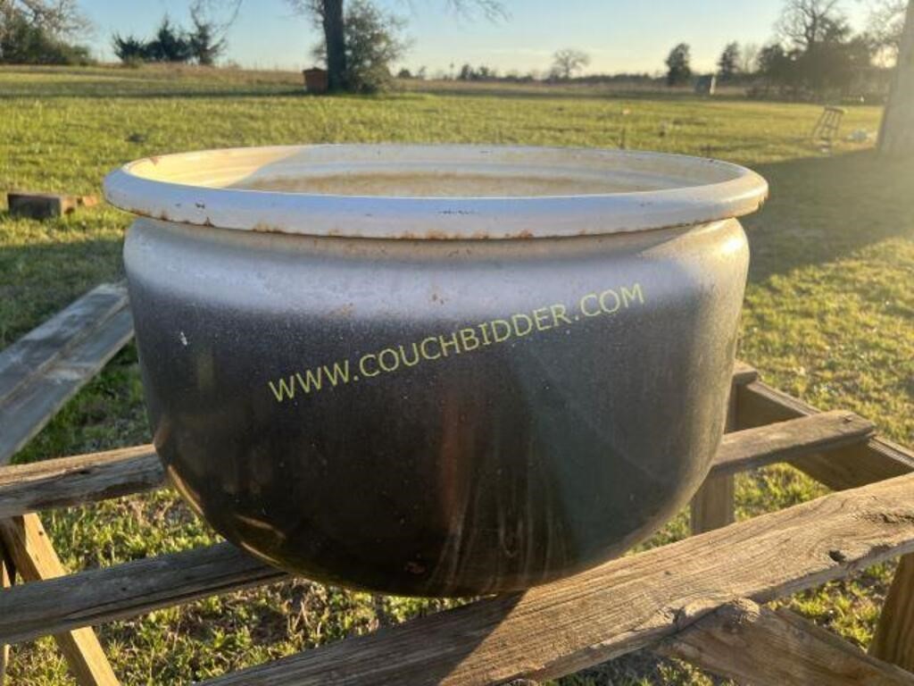 Old washing machine tub for planting