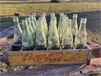 Old Coca Cola wooden crate with bottles