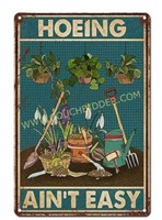 Hoeing Aint Easy metal garden sign 12X8"