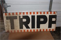 Tripp tin sign