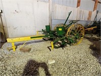 restored John Deere 2 bottom pull behind planter.