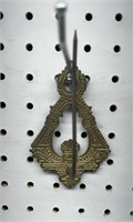 Brass string holder