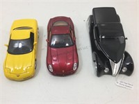 3 die cast model cars. Assorted