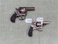 (2) Revolvers.