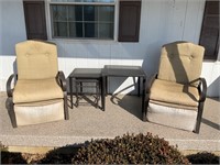 2 outdoor patio chairs with three outdoor tables