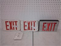 three EXIT signs