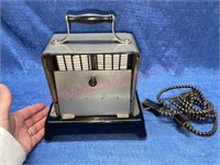 Antique chrome flip down side toaster
