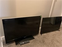 Small Sony flatscreen TV with remote and a small