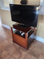 TV and stand.  Look at the photos for more