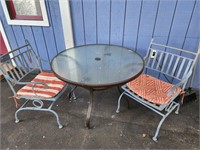 Patio furniture.  Table and 2 chairs.  Look at