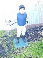 Cement lawn jockey. Look at the photos for more