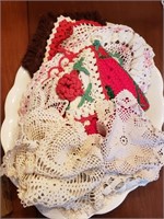 LOT OF DOILIES, POT HOLDERS, AND MORE