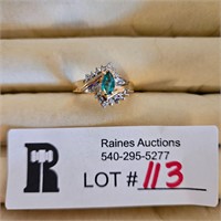 14 KT marked Gold Ring with green and clear stones