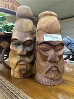 wooden face carving pair