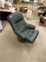 green recliner chair and ottoman