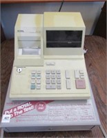 Royal ER 125 Cash Register powers on, has key