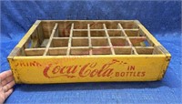 Yellow Coca-Cola wood crate (bottle holder)