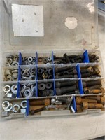 Plastic tray with nuts and bolts