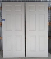 (2) Solid core 6 panel wood interior door slabs.