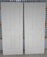 (2) 4 Panel wood interior door slabs. Both