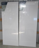 (2) JELD-WEN 2 panel wood interior door slabs.