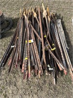 Pile of Used 6 Foot Fence Posts