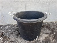 Black plastic feed tub