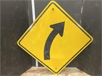 Road sign- curved road right