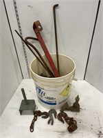 Pail of chain, hooks, misc