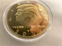 Donald Trump 2020 coin and a ring