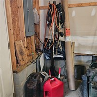 Coat rack w/ extension cords & lot of gas cans