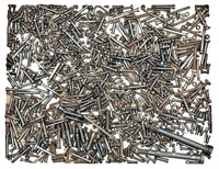 Large amount of firearm screws, machine and