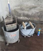 Two mop buckets