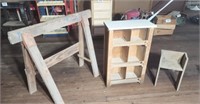 Saw horse & small cabinet.