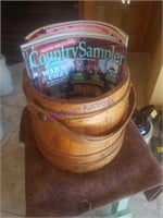 Wood pail with country living/quilting magazines