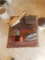 Wood garlic press, cast matchbox, cast hot plate,