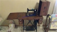 White tredle sewing machine