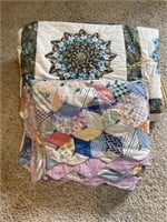 Quilts, appear to be handcrafted