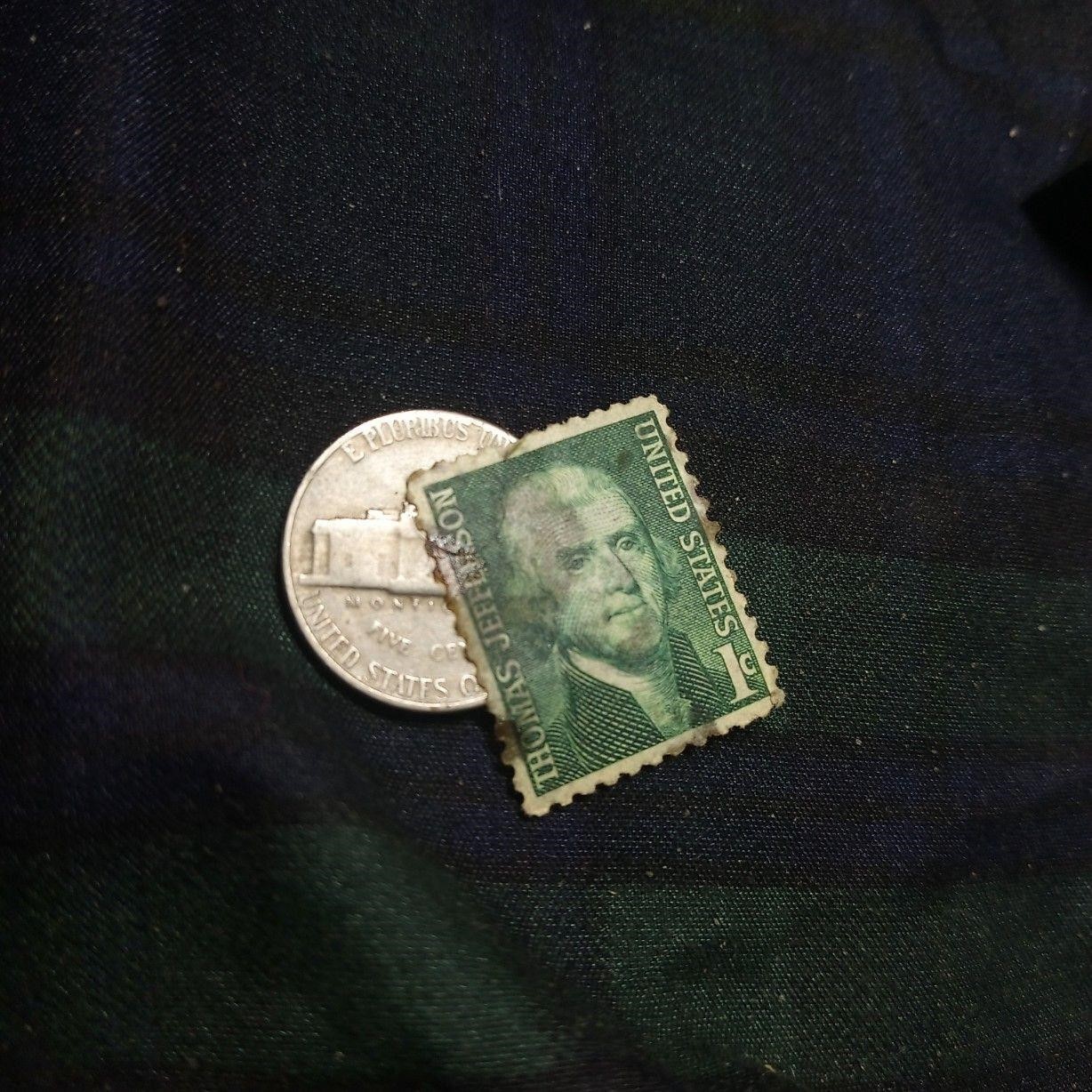 Thomas Jefferson stamp stuck to nickel