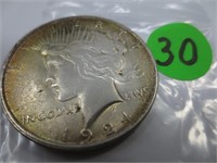 1924 Peace silver dollar, AU, toned