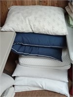 group of bed pillows