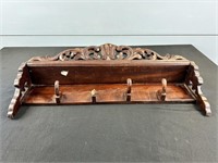 Carved Wooden Shelf With Hooks