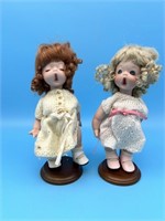 2 Singing Porcelain Dolls