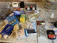 Basket full of household items bulbs & plugs, etc