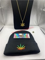 Beanie, pin, necklace and rolling papers (living