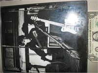 Framed black and white Beatles photo