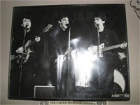 Black and white, framed Beatle photo