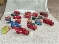 18 vehicle biscuit tins with moving wheels