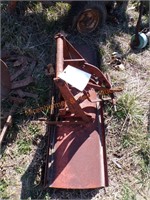 Orange lawn tractor blade, single bottom plow